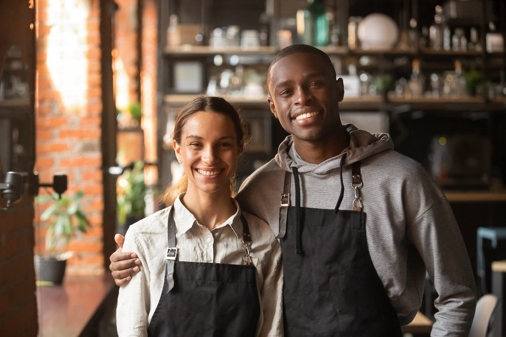 happy diverse waiter and waitress